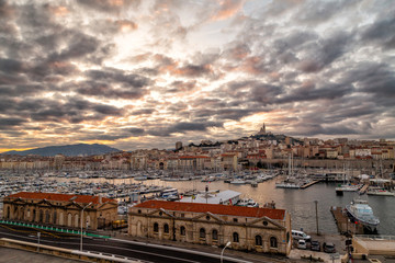 Marseille Old Port, France with Notre-Dame de la Garde church on the hill and old port