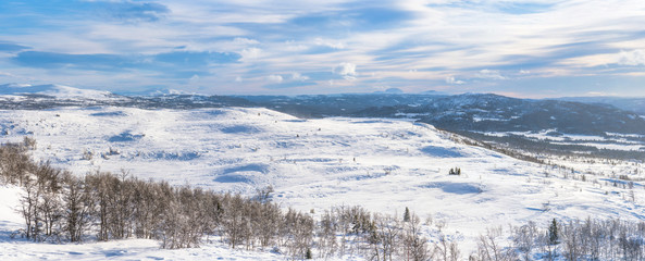 Wide panoramic view of winter landscape in Beitostolen. Winter in Norway