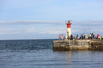Fototapeta premium angler in the harbor
