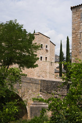 Fototapeta na wymiar Beautiful view of the medieval fortress of Girona from the side of the park through the eyes of a tourist.
