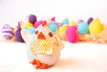colorful easter eggs and a hen on white background