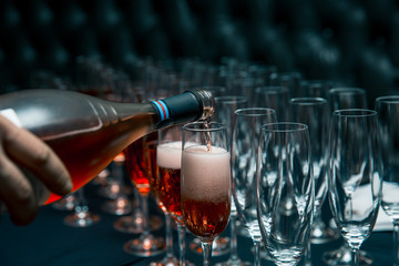 glasses, pour wine into glasses. celebration at event
