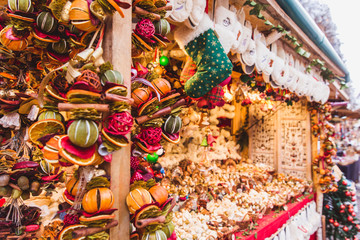 Fototapeta na wymiar New Year and Christmas fair. Dried fruit, spices, scenting decorations. Budapest, Hungary