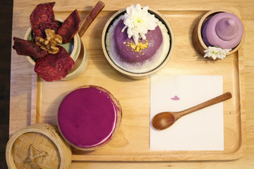 Fototapeta na wymiar Top view of Purple Sweet Potato Iceflakes, Potato ice cream and Tiramisu sweet purple potato.