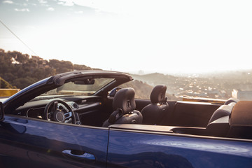 Blue luxury car in lookout