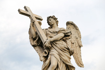 Naklejka premium Angel with the Cross Statue in Hadrian Bridge, Rome, Italy