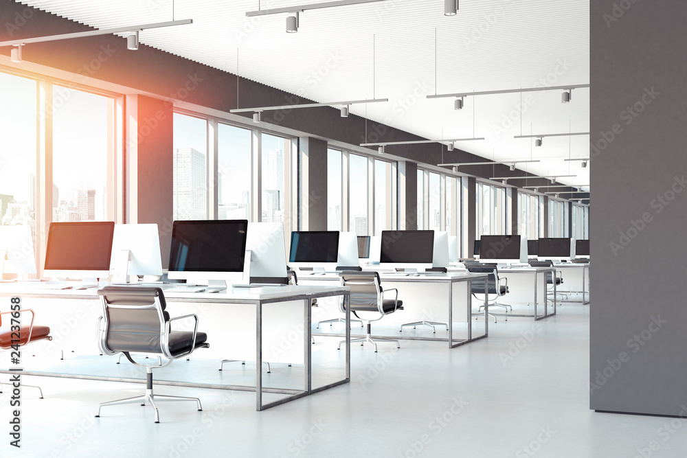 Poster pcs with big blank monitors on tables. open workspace at office. 3d rendering.