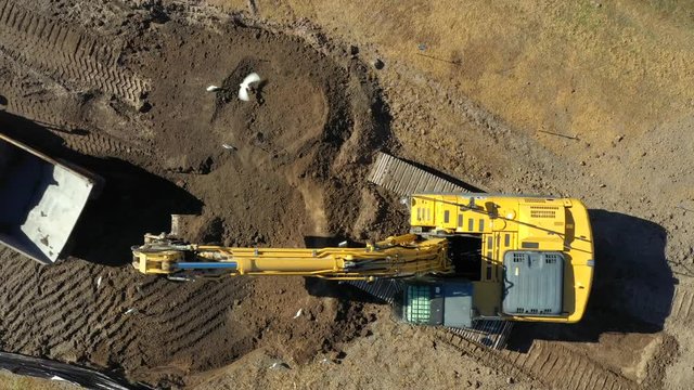 Kobelco excavator in action aerial drone video 4k