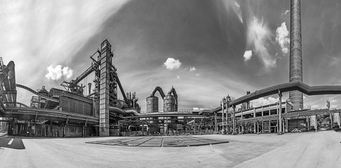 Disused blast furnace plant in Duisburg, Ruhr area district industry ruins - obrazy, fototapety, plakaty