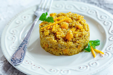 Quinoa porridge and pumpkin for a healthy breakfast.