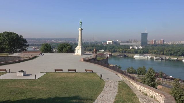Kalemegdan fortress and Victor monument in Belgrade, Sava and Danube rivers confluence view at sunny summer day, panorama 4k