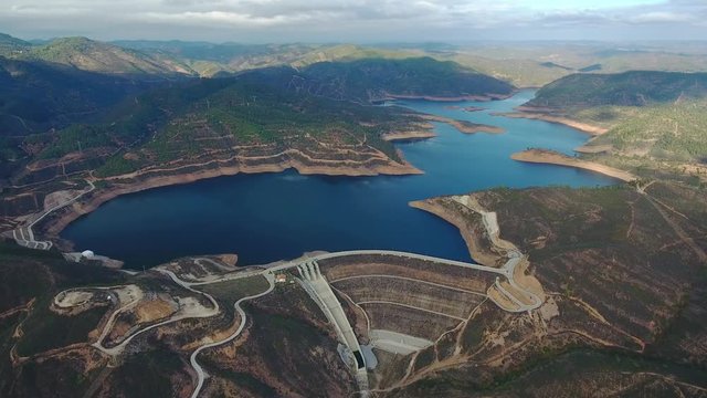 Aerial. Portuguese hydroelectro dam Odelouca, in mountains of Monchique. Algarve Portugal