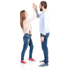 Beautiful woman gives five to man on white background isolation