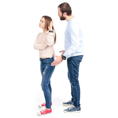 Beautiful woman offended by a man on a white background isolation