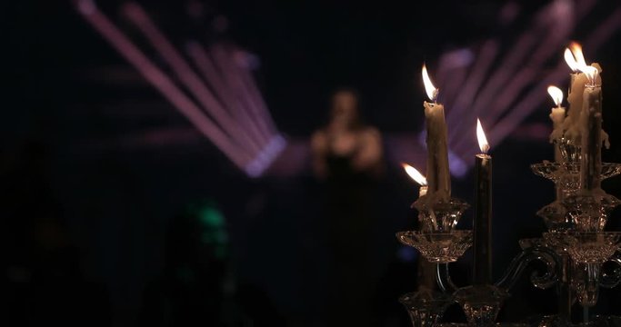 Goths. Evil party. Singer on stage.