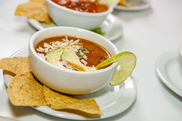 Mexican Soup with avocado and tortilla chips