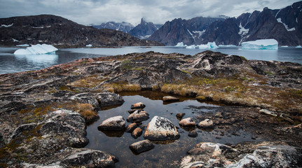 arctic landscape with icebergs among east Greenland fjords © Agata Kadar
