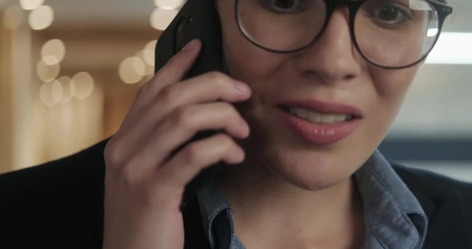Hysterical Angry Business Woman Screaming Madly at her Smartphone