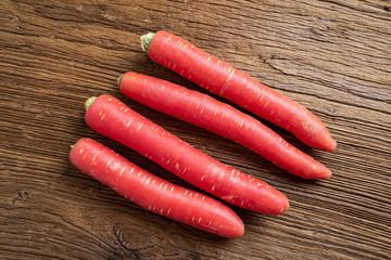 Slender red carrot