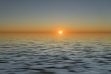 Fototapeta premium Seascape with a beautiful sunset over the water.