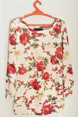 fashion beautiful shirt or sweater with roses pattern.