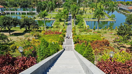 Stairs go down in Karangasem water temple in Bali, Indonesia. 