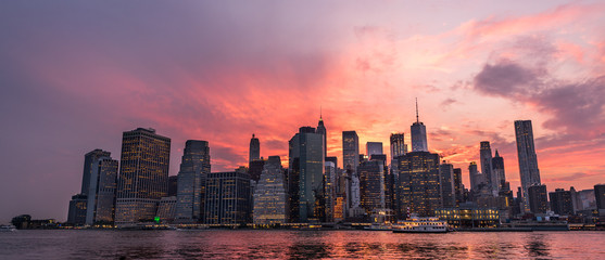 Image of the Manhattan skyline shot from Brooklyn Bridge Park during sunset