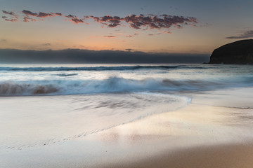 Sunrise Seascape the Beach and Low Cloud Bank