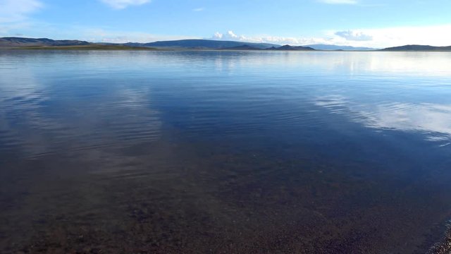 Calm Waters Of Mongolian Lake Telmen Lake Surrounded By Hills. Mongolia.