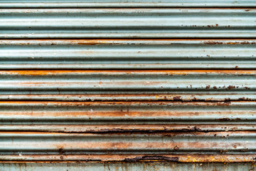 Steel rustic vintage rolling door. Rustic shutter door texture. Perfect for background.