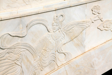 Chinese ancient traditional beautiful women sculpture on stone bridge