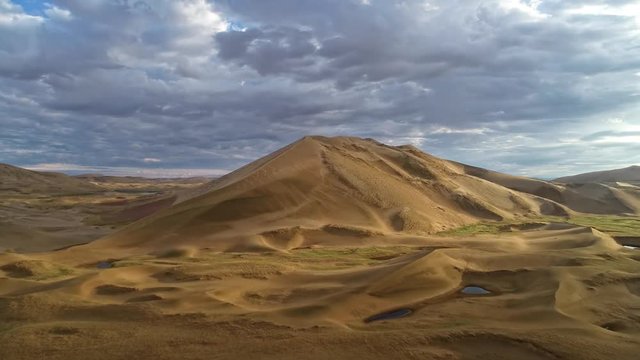 Barkhans in Mongolia sandy dune desert Mongol Els near lake Durgen Nuur. Khovd province, Western Mongolia.