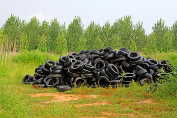 Piles of waste rubber tyre