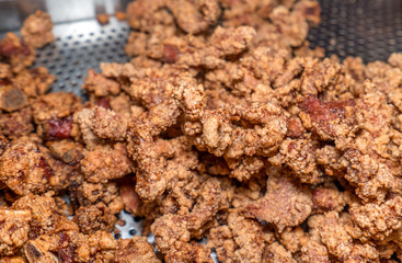 Fresh and delicious Taiwanese deep fried chicken (Salt crispy chicken) in Taiwan's night market, close up.