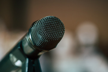 Seminar Conference Concept : Close-up Microphones on abstract blurred of speech in meeting room,...