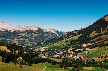 Fototapeta na wymiar Valley, Schrattenfluh and Sorenberg town at foot of Brienzer Rothorn, Switzerland