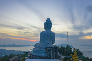 Fototapeta premium aerial photography scenery blue sky and blue ocean behind Phuket white big Buddha. Phuket white big Buddha is the .famous landmark in Phuket island a lot of tourists visiting this landmark every day