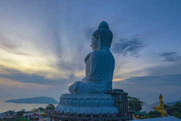 Fototapeta premium aerial photography scenery blue sky and blue ocean behind Phuket white big Buddha. Phuket white big Buddha is the .famous landmark in Phuket island a lot of tourists visiting this landmark every day