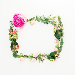 Floral frame of pink flowers, hypericum and eucalyptus branches on white background. Flat lay, top view