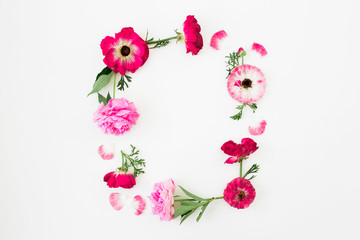Floral frame with pink spring flowers on white background. Flat lay, Top view. Flowers texture.