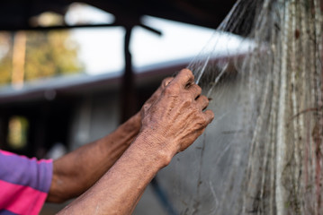 Close up old hand fisherman.