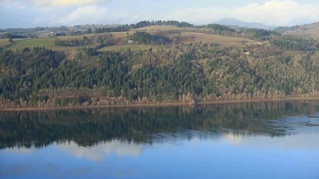 Columbia River Gorge View From Vista House with Blue Sky and Calm Reflecting River