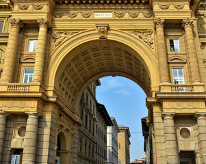Arcone Triumphal Arch at the Republic Square in Florence, Italy. The Arch was built in 1895. Old city. Tourist attractions. Italian architecture. Landmarks of Italy.