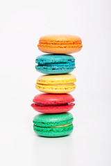 Sweet and colourful macaroons or macaron on white background.