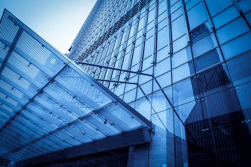 Obraz premium Contemporary architectural office building, urban landscape, personal perspective,