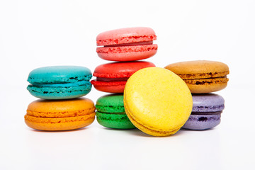Sweet and colourful macaroons or macaron on white background.