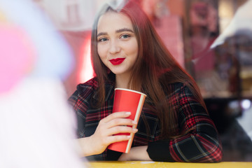 Woman Drink Her Hot Coffee While Sitting In Cafe. Portrait Of Stylish Smiling Woman In Winter Clothes Drinking Hot Coffee. Female Winter Style. - Image