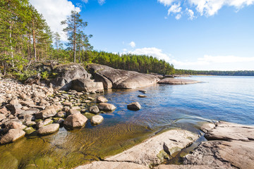 Onega Lake shore landscape. Karelia. Transparent water