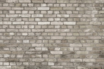 Old grey brick wall background texture