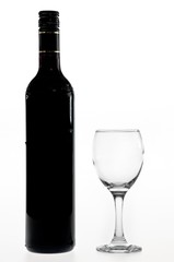 bottle and glass of red wine